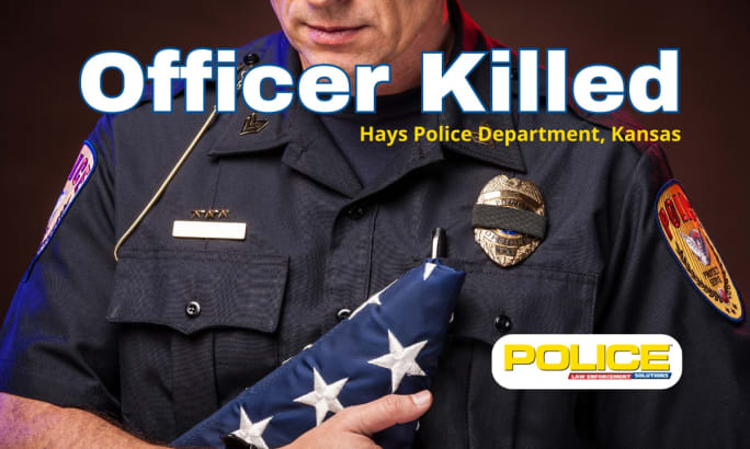 Police officer's uniform with badge, mourning band, and folded American flag