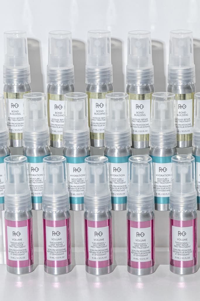 Rows of R+Co's new pro treatments offer skincare-inspired solutions that transform hair in minutes.