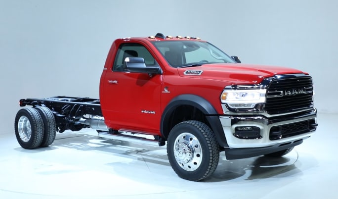A red Ram truck chassis and cab on a white background.