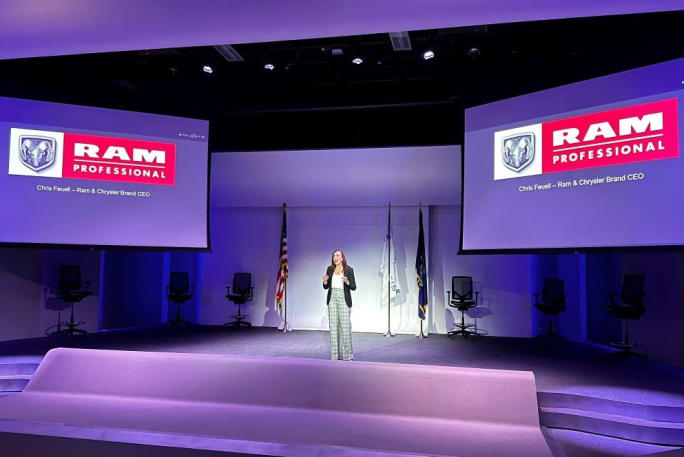 Ram Chrysler CEO Chris Feuell on stage. 
