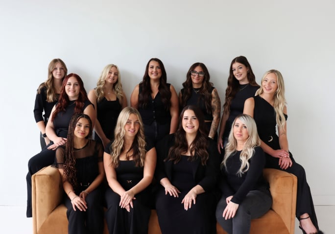 A group shot of the team from Raven Hair Co.