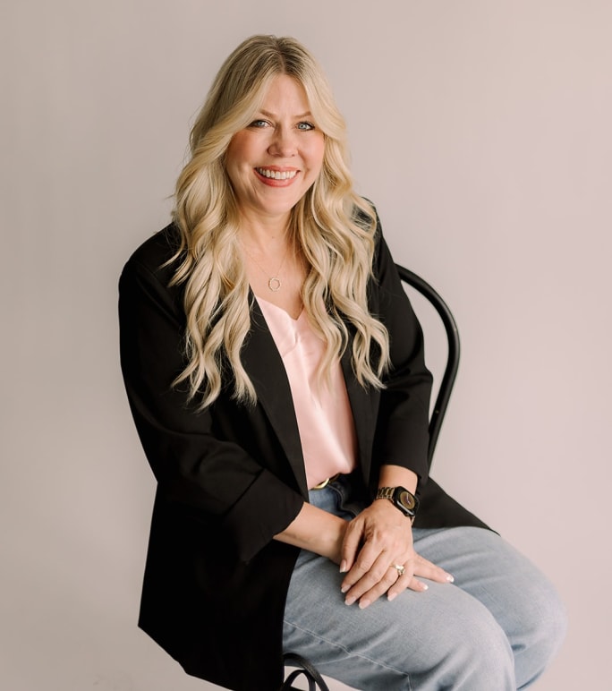 A portrait shot of Lora Powell.