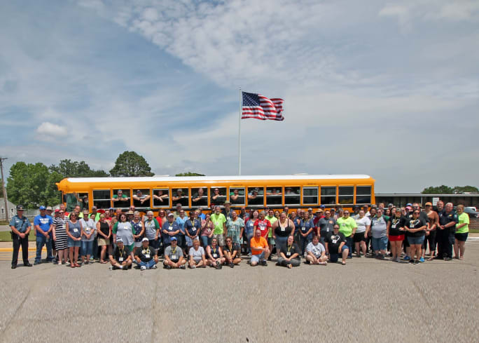 School bus and safety competition participants.
