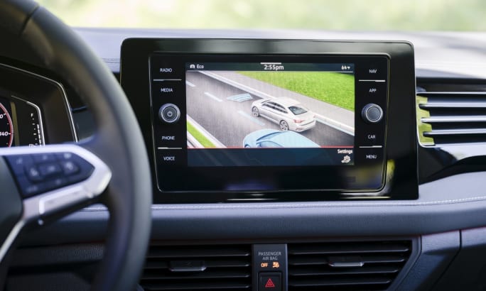 Interior of a 2025 Volkswagen Jetta displaying driver assistance systems on the infotainment center.