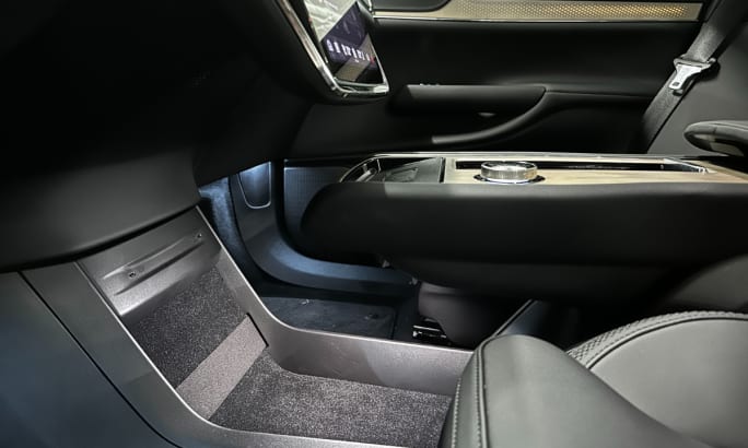 Interior side view of driver and passenger area. 