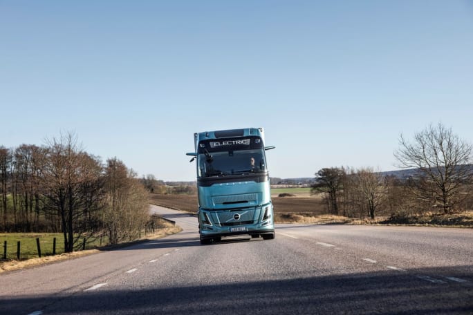 A Volvo FH Electric truck on the highway.