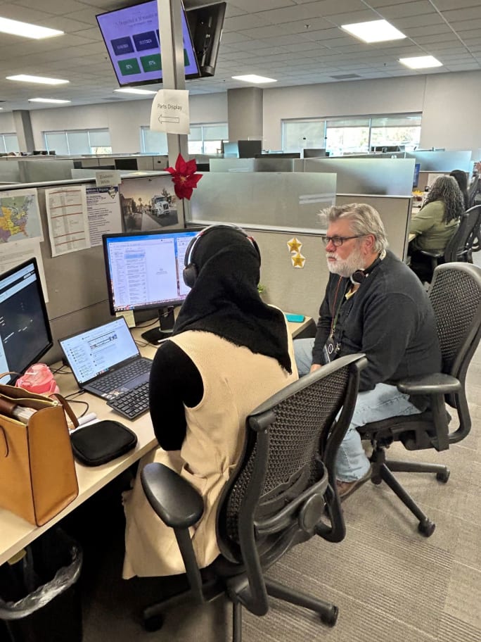 Volvo customer service representative Zoubeida White and HDT Executive Editor Jack Roberts.