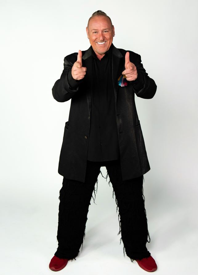 A man doing the thumbs up sign