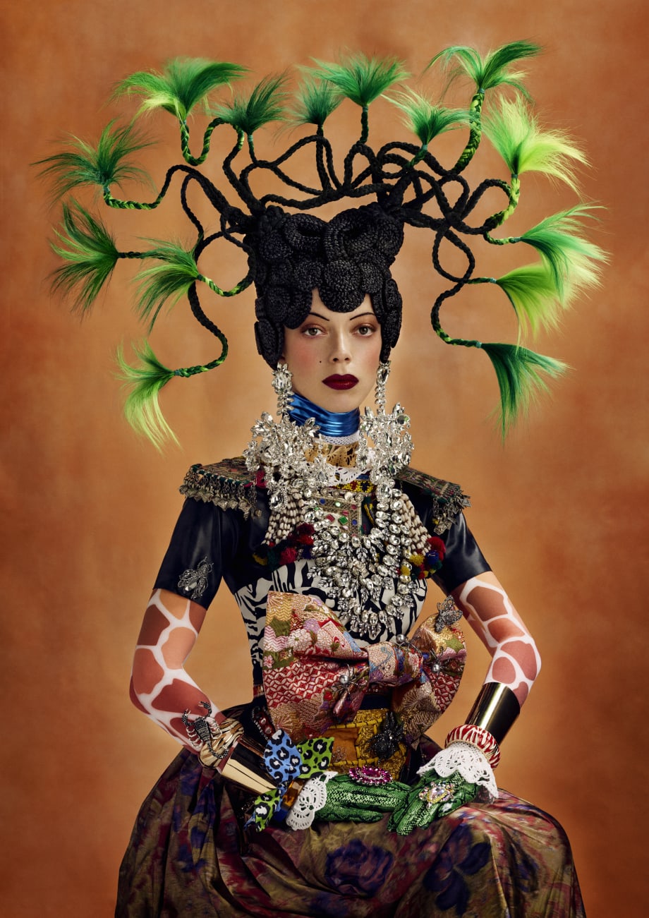 A woman in colorful hair and clothes.