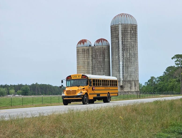 School bus with silos.