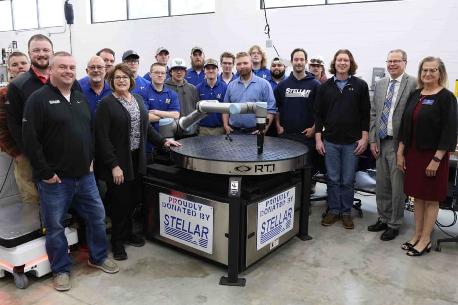 The Robotics team at North Iowa Area Community College pose with their new robot