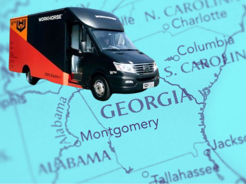 Orange and black van-type delivery truck inset against an image of a map of Georgia.