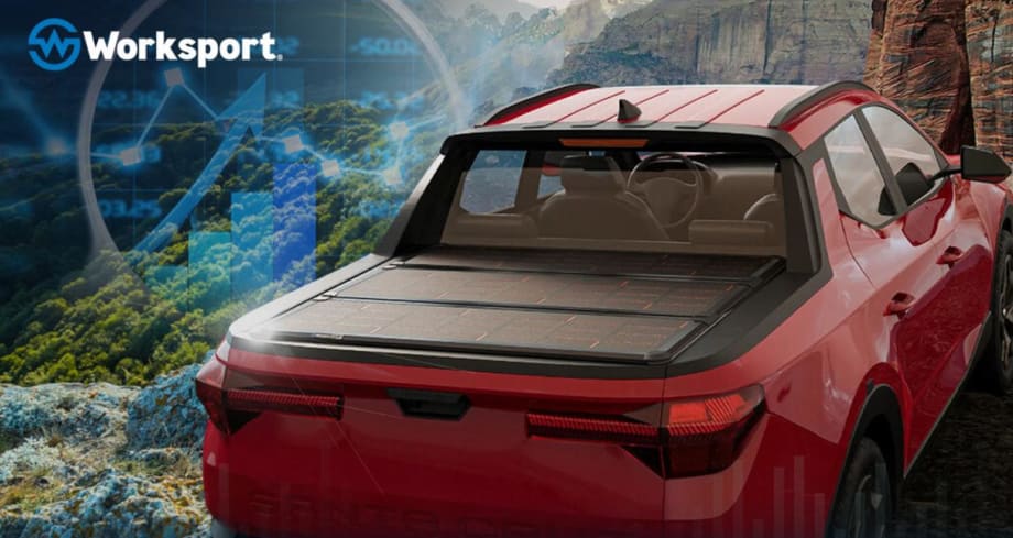 Red pickup truck with a tonneau cover with solar cells.