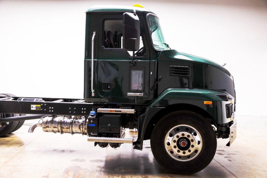 Side view of a medium duty cab truck.