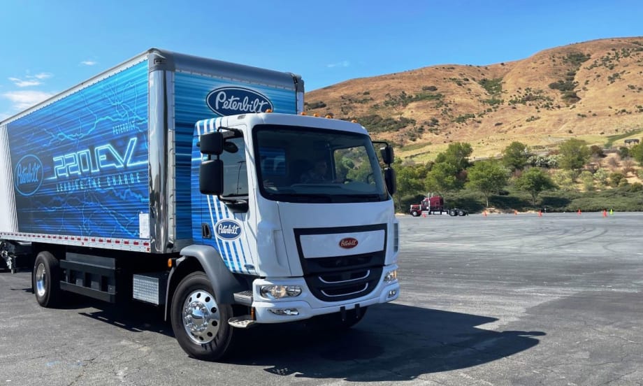 white and blue box truck