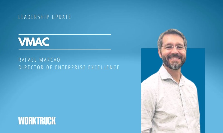 Business man on a blue background and company name of VMAC.