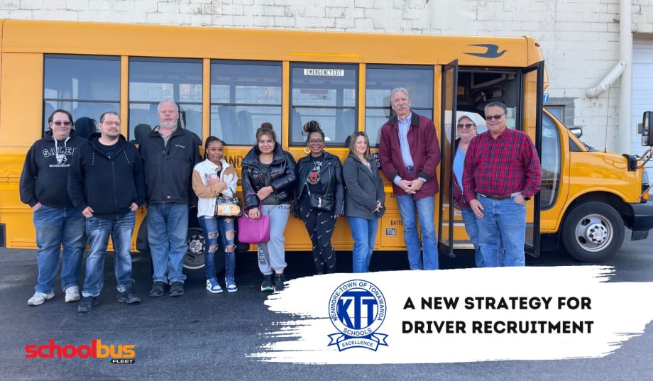 a group of people stands in front of a school bus
