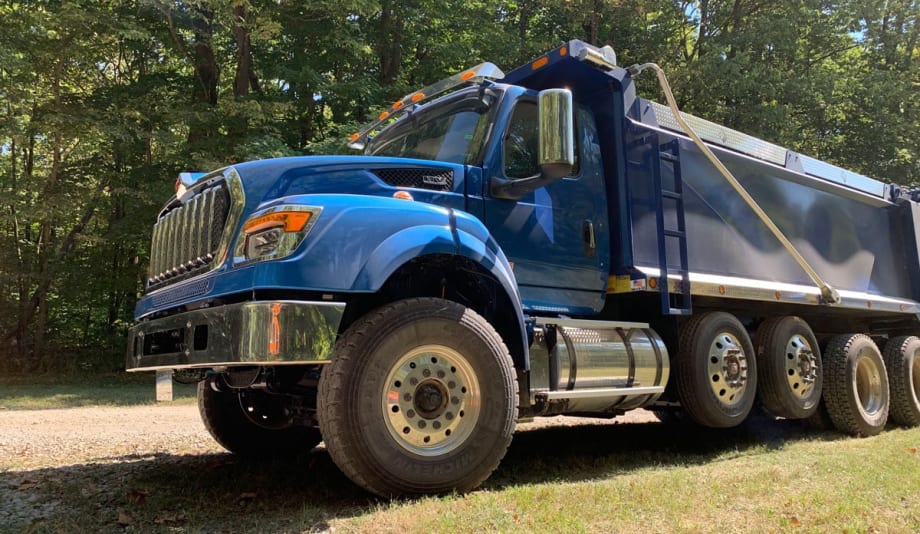 Blue truck with dump body