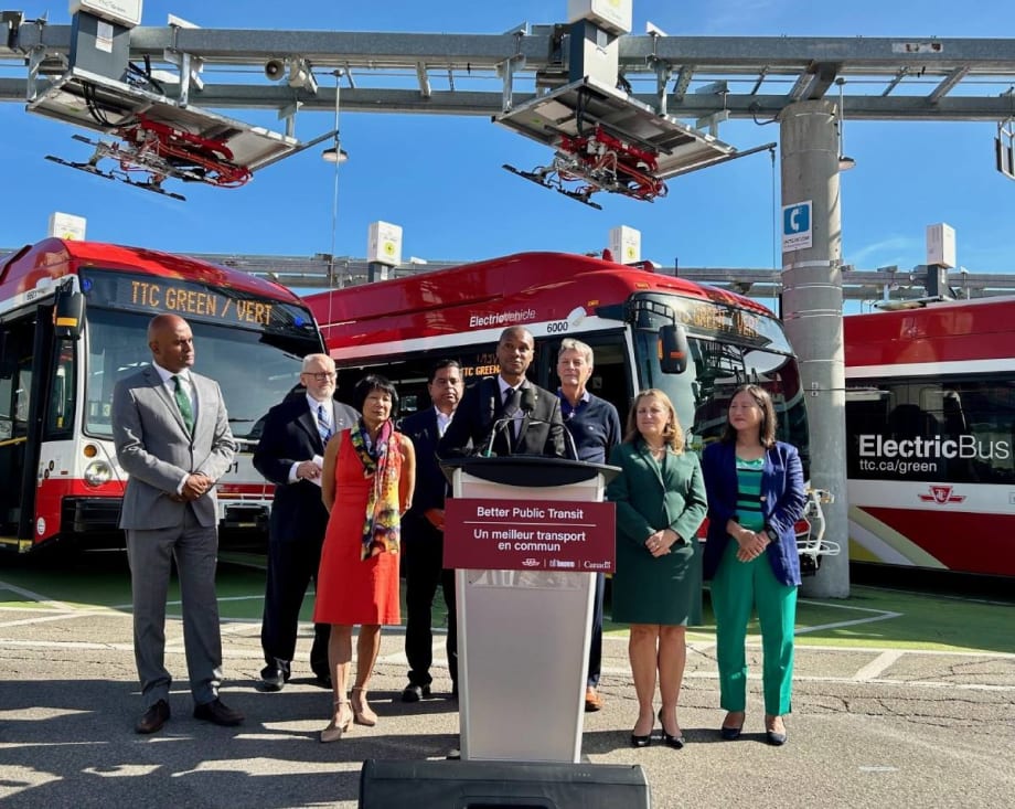 Toronto Transit Commission members unveiling new electric buses.