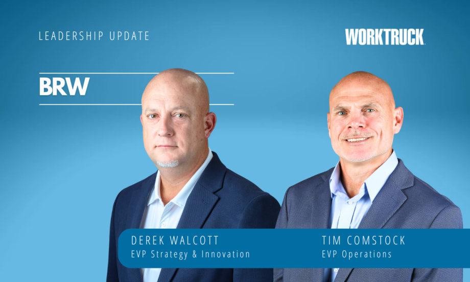 Two men in business attire in front of a blue background.