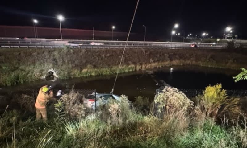 VA Troopers Save Woman from Submerged Car