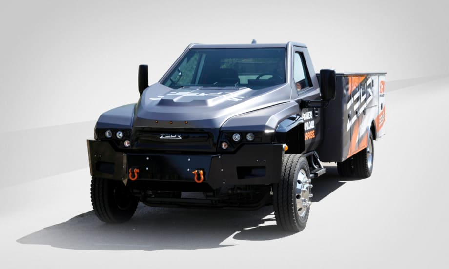 Medium-duty battery-electric truck with a service body.