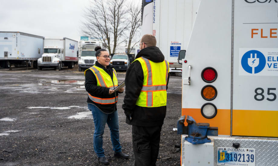 Two maintenance technician prepare a fleet for winter weather.