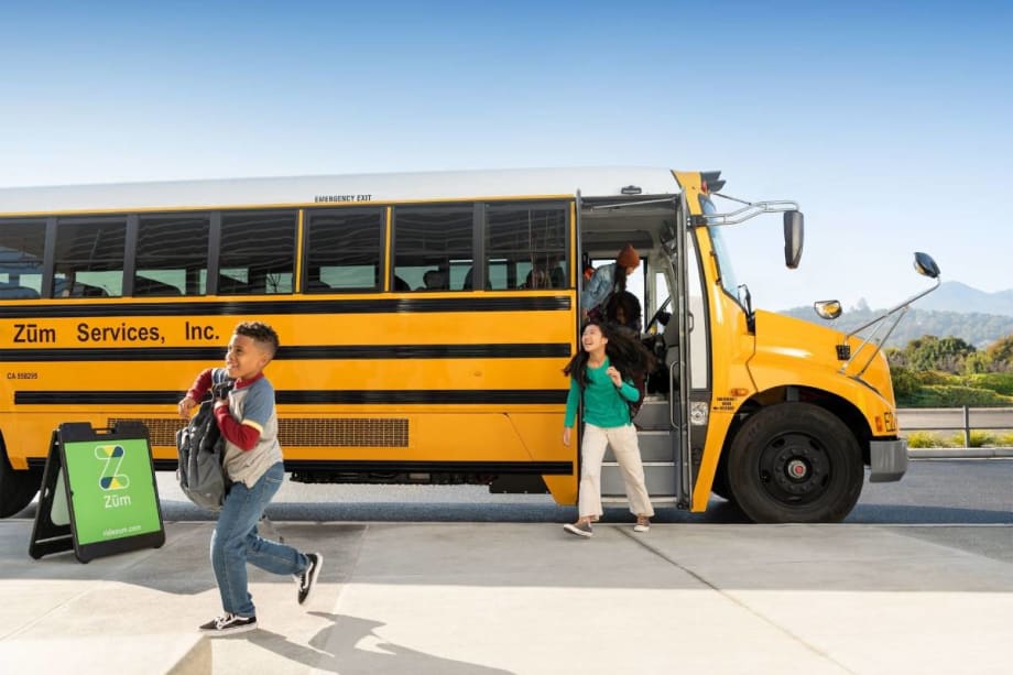 Children exiting a Zum bus.