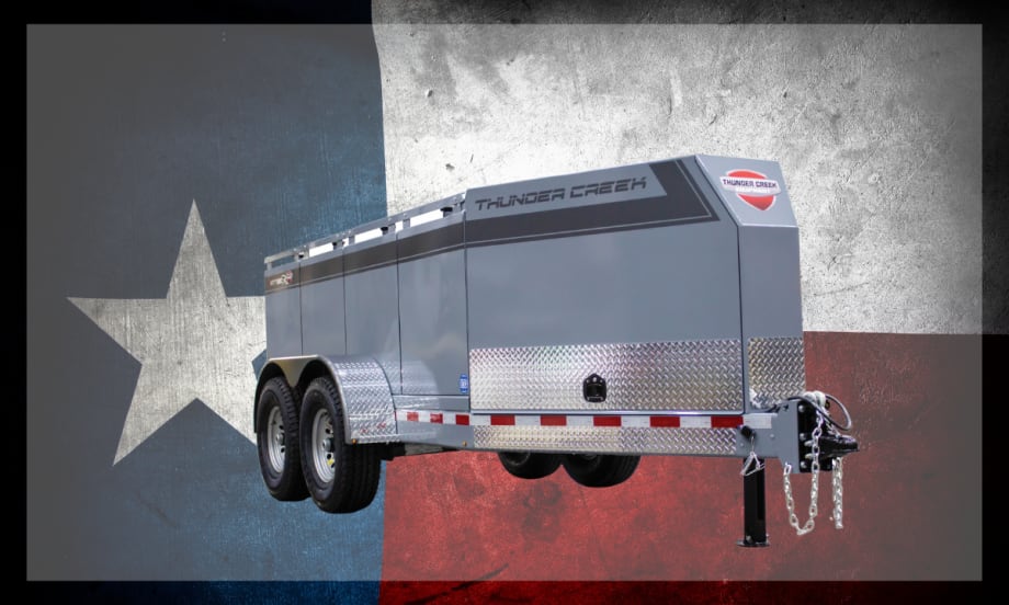Fuel tank trailer against background of a Texas flag.