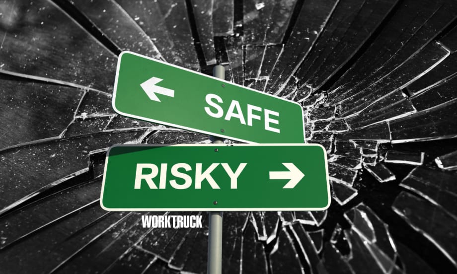 Sign showing safe one way and risky the other on broken glass background.