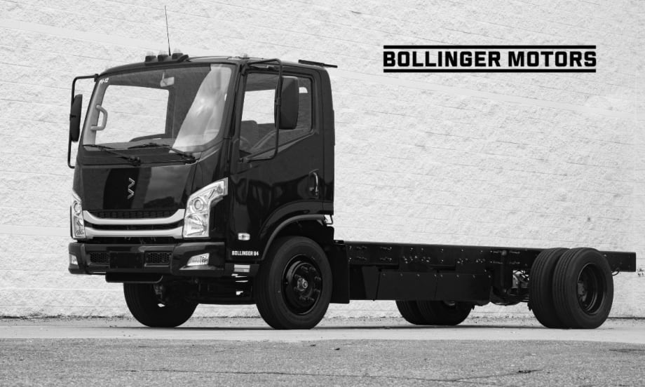 Chassis cab electric truck with Bollinger Motors logo on the background.