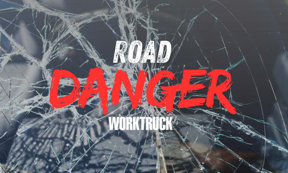 Broken glass with ROAD DANGER