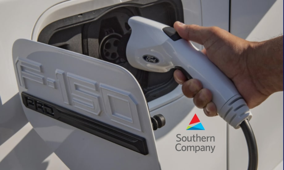 A Ford F-150 Lightning being charged with Southern Company logo