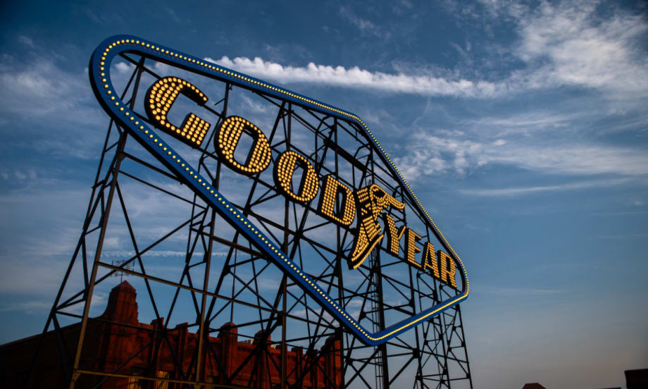 Goodyear sign against a blue sky.