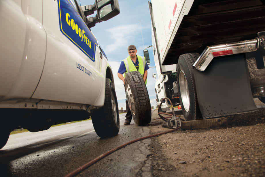 Maintenance tech working on tire for Goodyear Fleet HQ