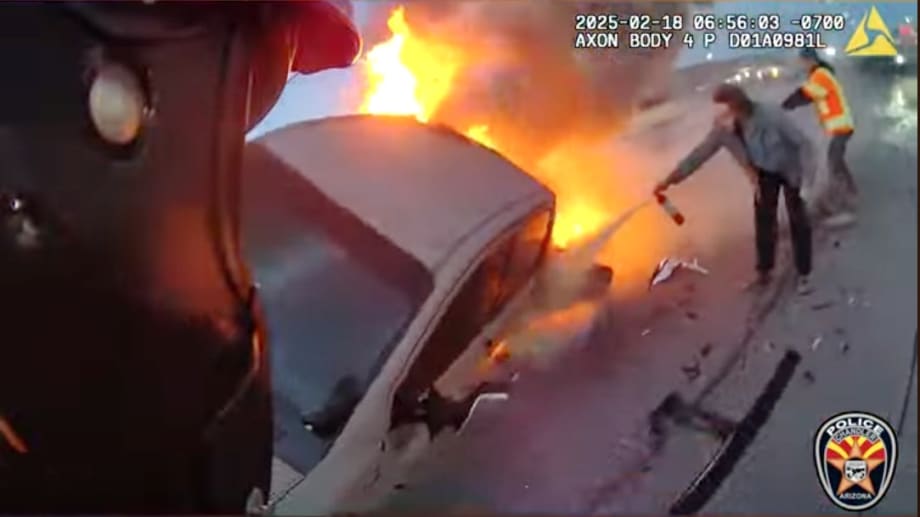 BWC Video: Officer and Firefighter Rescue Woman from Burning Truck