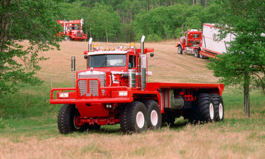 An older classic Kenworth straight truck working offroad.