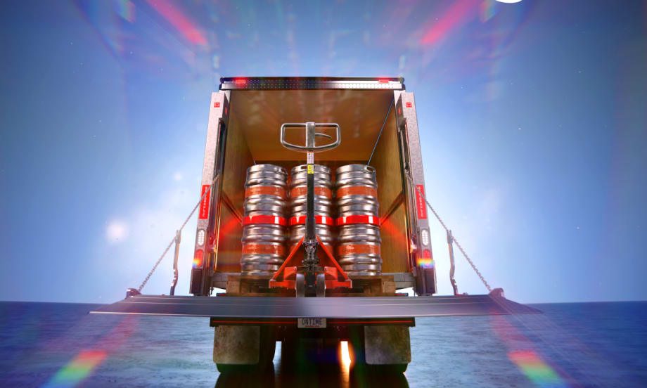 Rear of truck with liftgate and cargo inside.