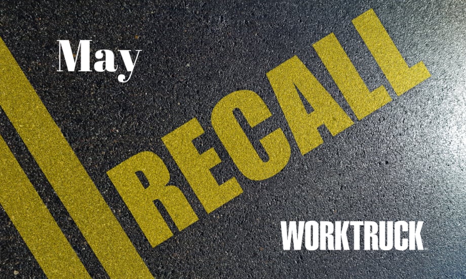 Pavement background with double yellow lines and large text that says Recall, April, and Work Truck logo.
