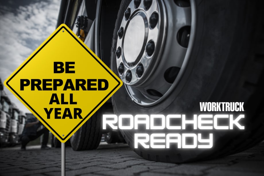Be Preapred All Year, Work Truck Roadcheck Ready with semi-truck tires in the background