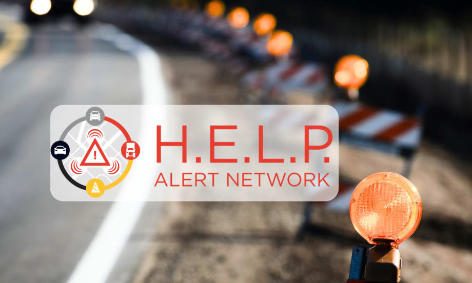 Background image of traffic warning lights along edge of road approaching a curve and inset logo for H.E.L.P. Alert Network.