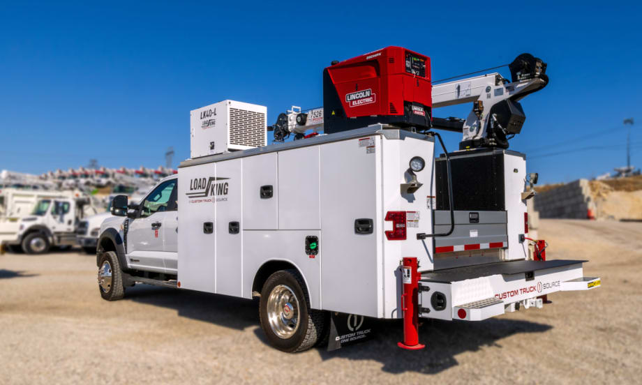 white service body truck with a crane.