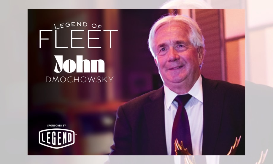 Fleet leader John Dmochowsky poses with industry awards recognizing his decades of service, innovation, and impact in commercial and global fleet operations.
