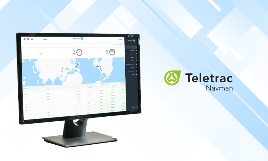Monitor displaying Teletrac Navman’s TN360 fleet management map and data dashboard on a blue geometric background with the Teletrac Navman logo shown on the right side of the image.