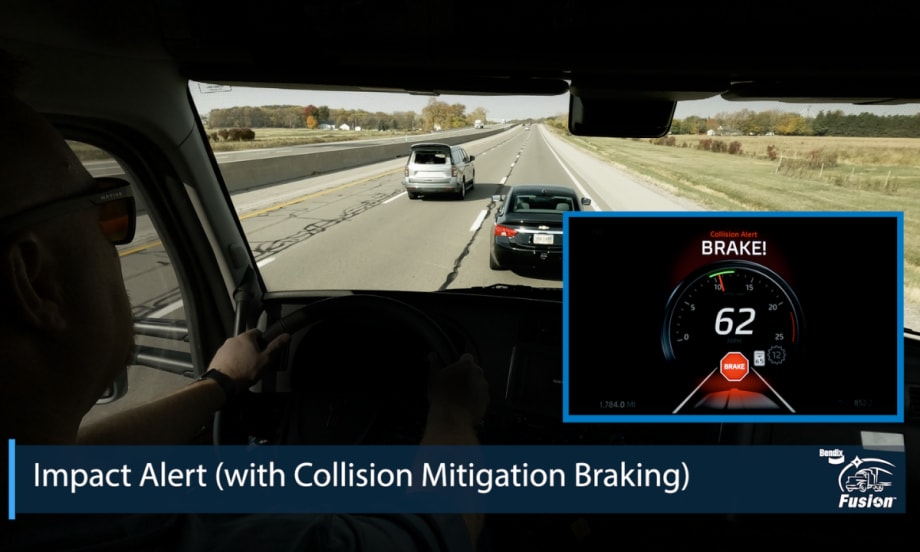 View from a truck cab showing Bendix Fusion collision alert on a dashboard display with a warning to brake at 62 mph.