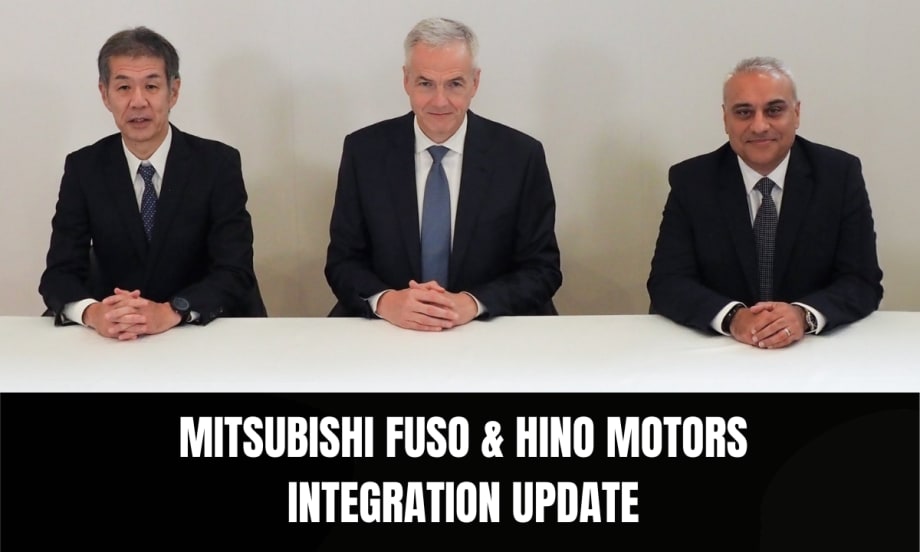 Three executives seated at a table — Satoshi Ogiso of Hino Motors, Karl Deppen of Mitsubishi Fuso, and Hetal Laligi of Mitsubishi Fuso — announcing updates on the ARCHION Corporation integration plan