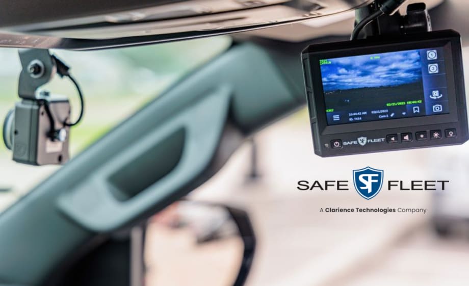 in-car view of windshield and a small screen with a  video image