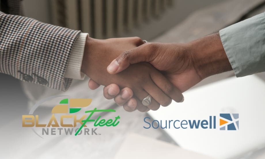 Two people shake hands representing a new partnership between Black Fleet Network and Sourcewell to strengthen fleet education and professional growth.
