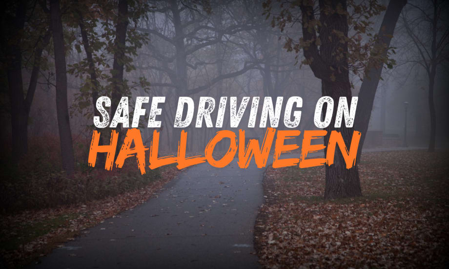 Safe Driving on Halloween graphic on top of spooky fall foggy street