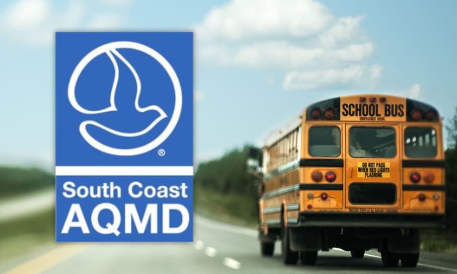 South Coast AQMD logo alongside a school bus driving on a roadway, representing new funding to replace diesel buses with zero-emission models for Southern California school districts.